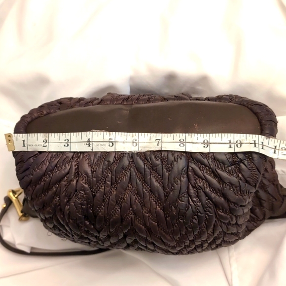 Here is a 70th anniversary edition Coach bag - Picture 10 of 15